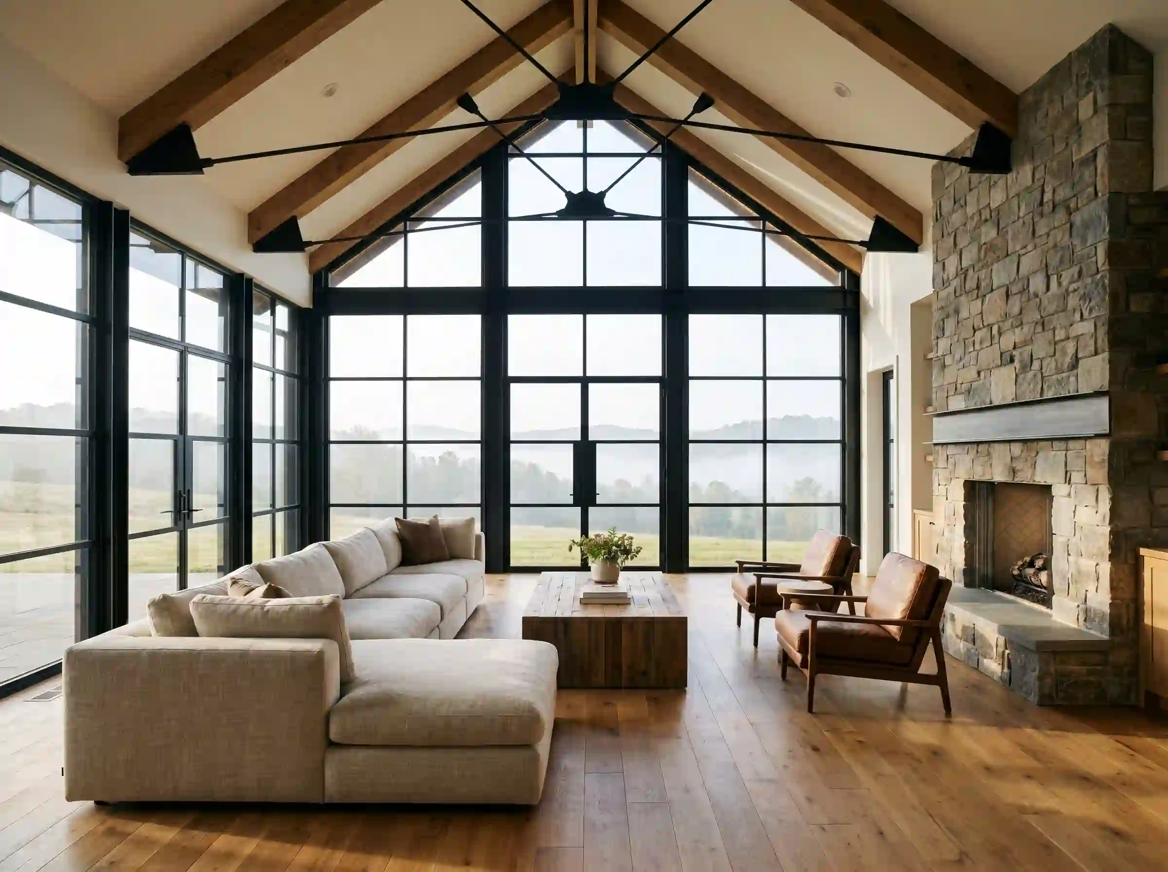 Great room with vaulted ceiling and floor-to-ceiling steel windows